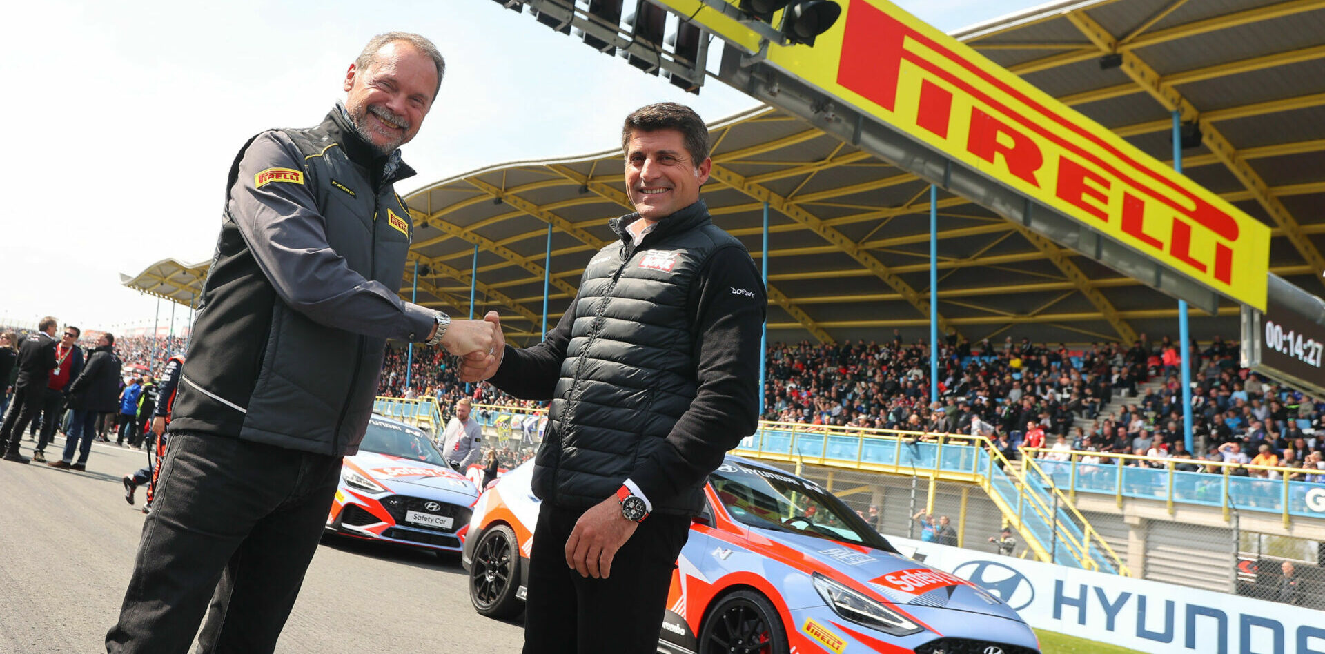 Pirelli Motorcycle Racing Director Giorgio Barbier (left) and WorldSBK Executive Director Gregorio Lavilla (right). Photo courtesy Dorna.