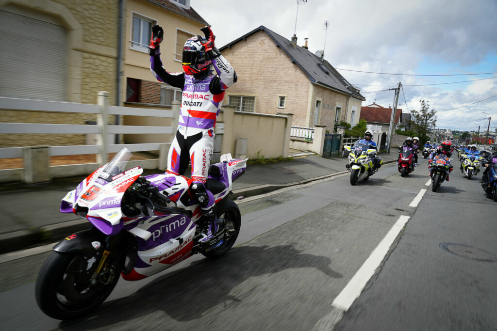 Johann Zarco (5) taking a turn leading the parade of motorcycles to the Bugatti Circuit. Photo courtesy Dorna.