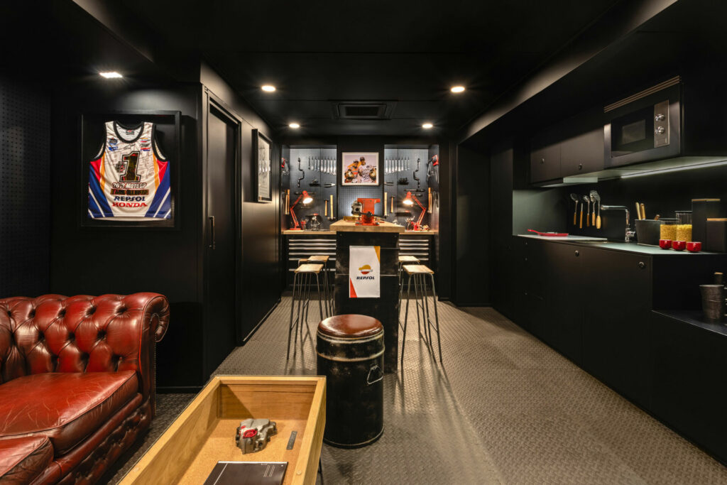 The living area includes a kitchen and a dining/workshop space. Photo by David Vilanova, courtesy Airbnb.