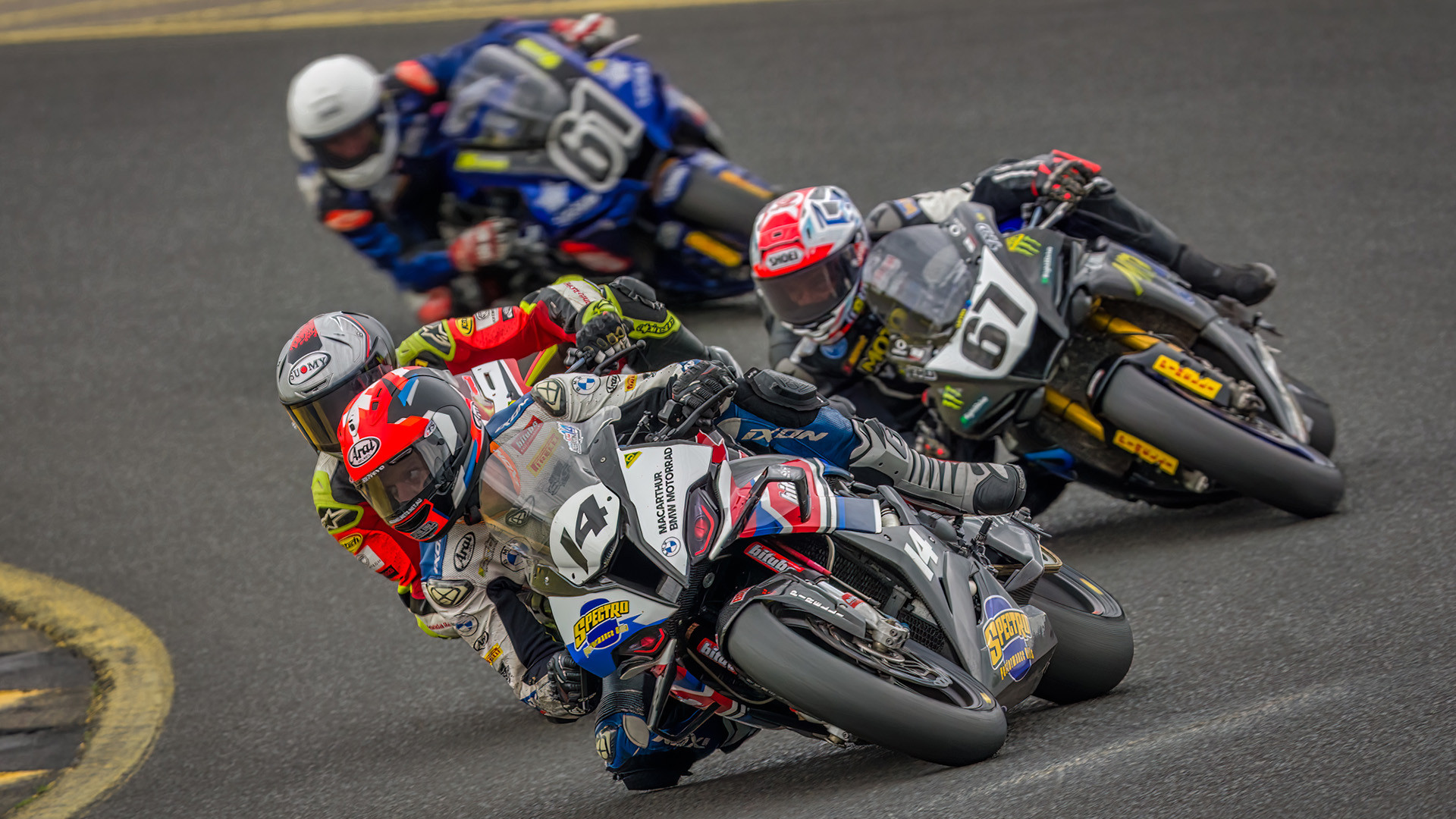 Glenn Allerton (14), Troy Herfoss (behind Allerton), and Bryan Staring (67) in action at a previous Australian Superbike round. Photo courtesy ASBK.