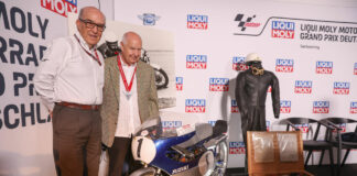 Hans-Georg Anscheidt (right) with Dorna CEO Carmelo Ezpeleta (left) and Anscheidt's World Championship winning Suzuki. Photo courtesy Dorna.