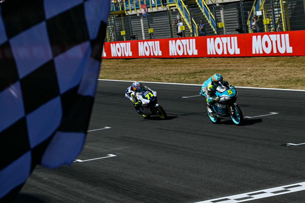 Jaume Masia (5) held off Ayumu Sasaki (71) to win in Moto3. Photo courtesy Dorna.