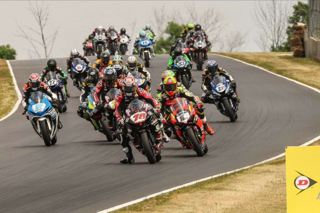 Tyler Scott (70) leads eventual winner Xavi Fores (12) and the rest of the Supersport pack at Road America on Sunday. Photo by Brian J. Nelson, courtesy MotoAmerica.