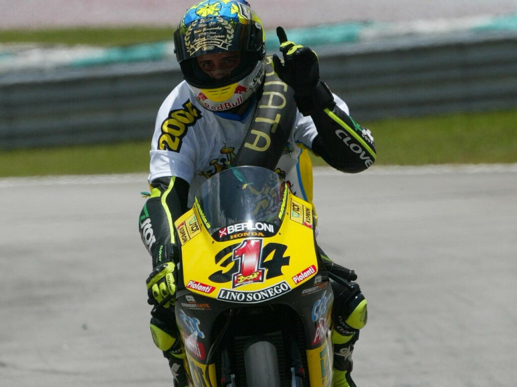 Andrea Dovizioso (34/1) in 2004 when he won the 125cc World Championship. Photo courtesy Dorna.