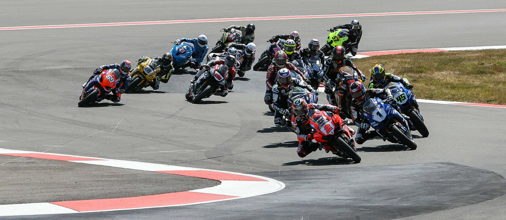 Josh Herrin (2) leads Jake Gagne (1), Cameron Petersen (45), Cameron Beaubier (hidden) and the rest of the Medallia Superbike pack at Ridge Motorsports Park on Saturday. Photo by Brian J. Nelson.