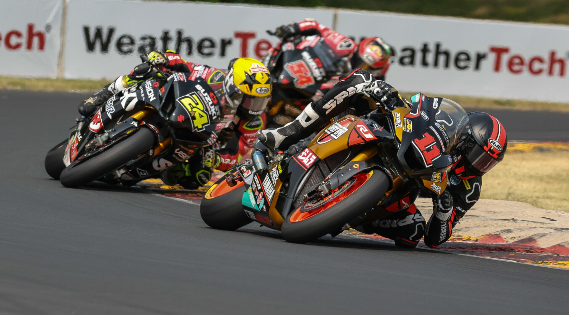 Mathew Scholtz (11) leads Toni Elias (24) and Richie Escalante (54) during Race Two at Road America. Photo by Brian J. Nelson, courtesy Westby Racing.