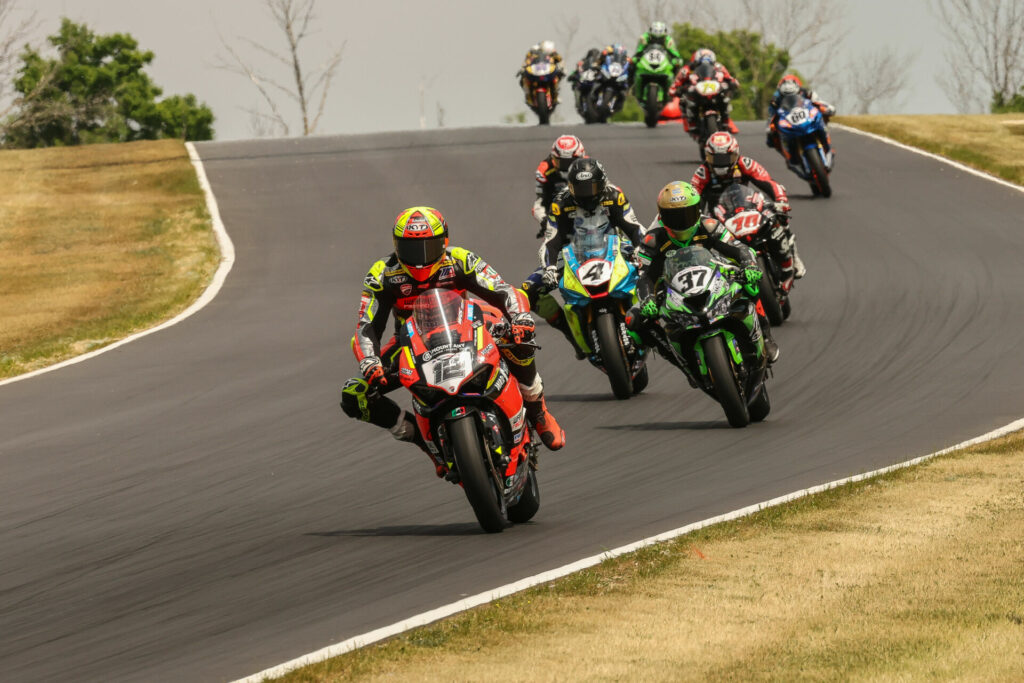 Xavi Fores (12) won his fourth straight Supersport race on Saturday at Road America with victory over Stefano Mesa (37) and Josh Hayes (4). Photo by Brian J. Nelson.