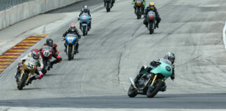 Action from the Royal Enfield Build. Train. Race. race at Road America in 2022 with Kayleigh Buyck (16) leading from the start. Photo by Brian J. Nelson.