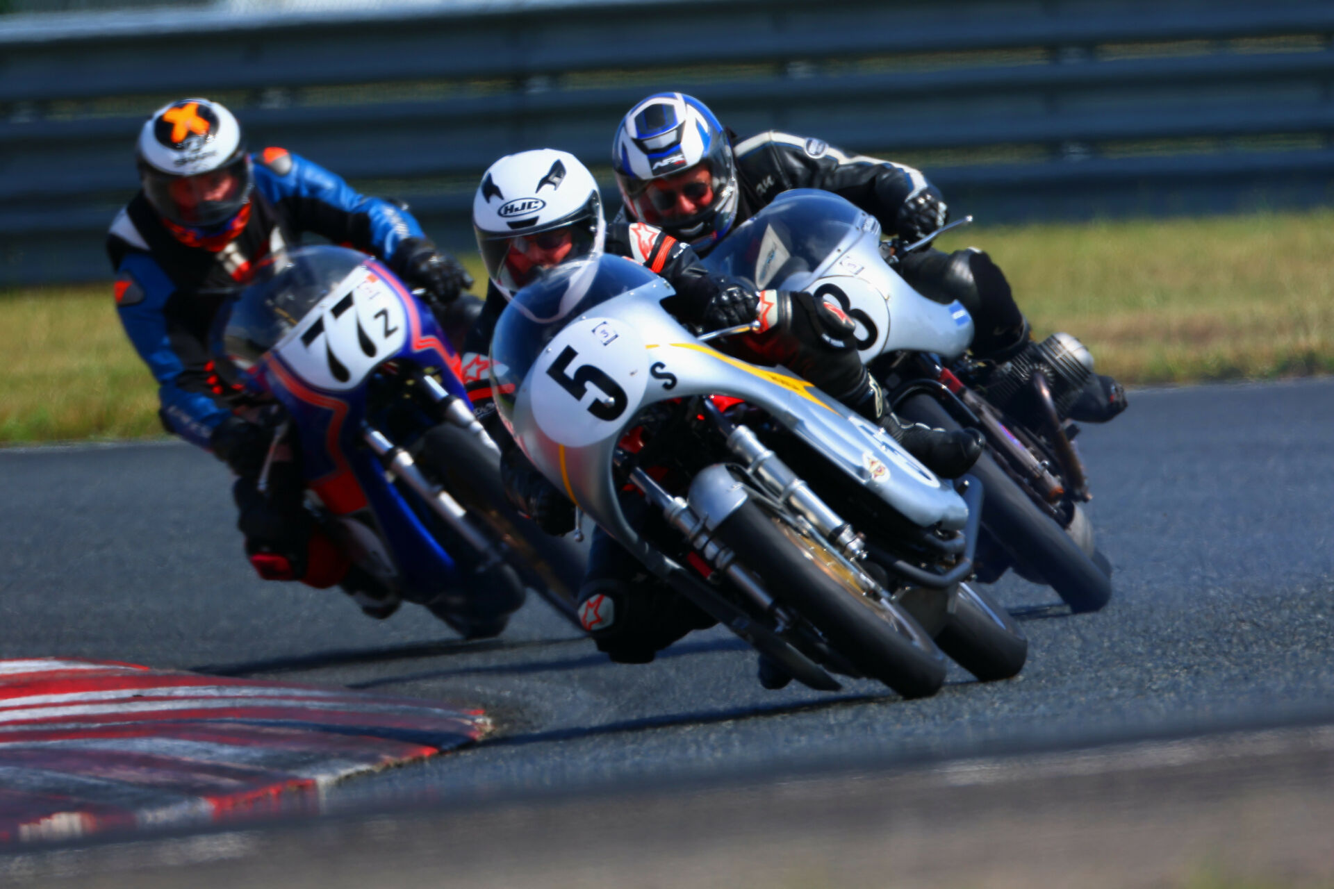 AHRMA racers Martin Morrison (5s) and Dan Sokolich (77z) in action at New Jersey Motorsports Park. Photo by etechphoto.com, courtesy AHRMA.