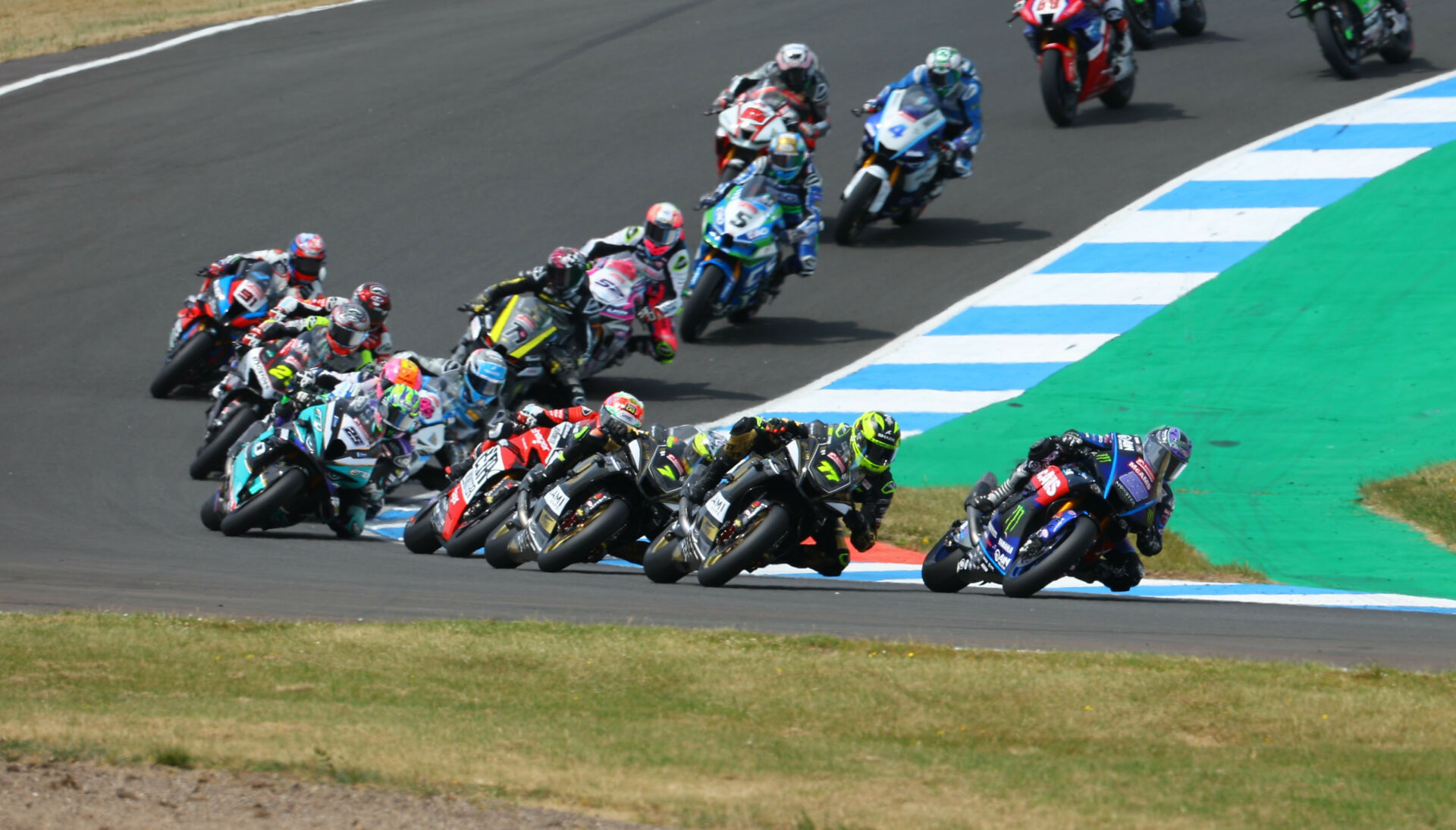 Jason O'Halloran (22) leads Kyle Ryde (77) and the rest of the British Superbike field at Knockhill Circuit. Photo courtesy MSVR.
