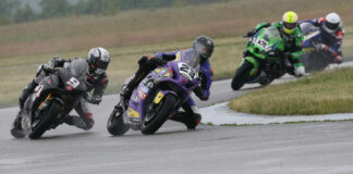 Championship leader Alex Dumas (23) endured the wet conditions Sunday at Grand Bend to take the win. Trevor Daley (9) and Tomas Casas (hidden) both crashed and remounted to finish fourth and 10th, respectively, while Jordan Szoke's (101) race ended early due to a mechanical problem. Photo by Rob O'Brien, courtesy CSBK.