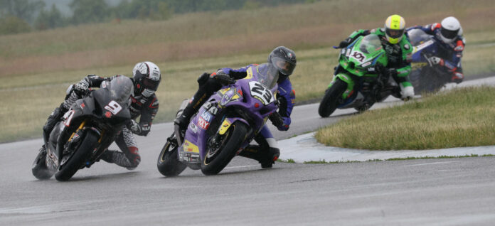 Championship leader Alex Dumas (23) endured the wet conditions Sunday at Grand Bend to take the win. Trevor Daley (9) and Tomas Casas (hidden) both crashed and remounted to finish fourth and 10th, respectively, while Jordan Szoke's (101) race ended early due to a mechanical problem. Photo by Rob O'Brien, courtesy CSBK.