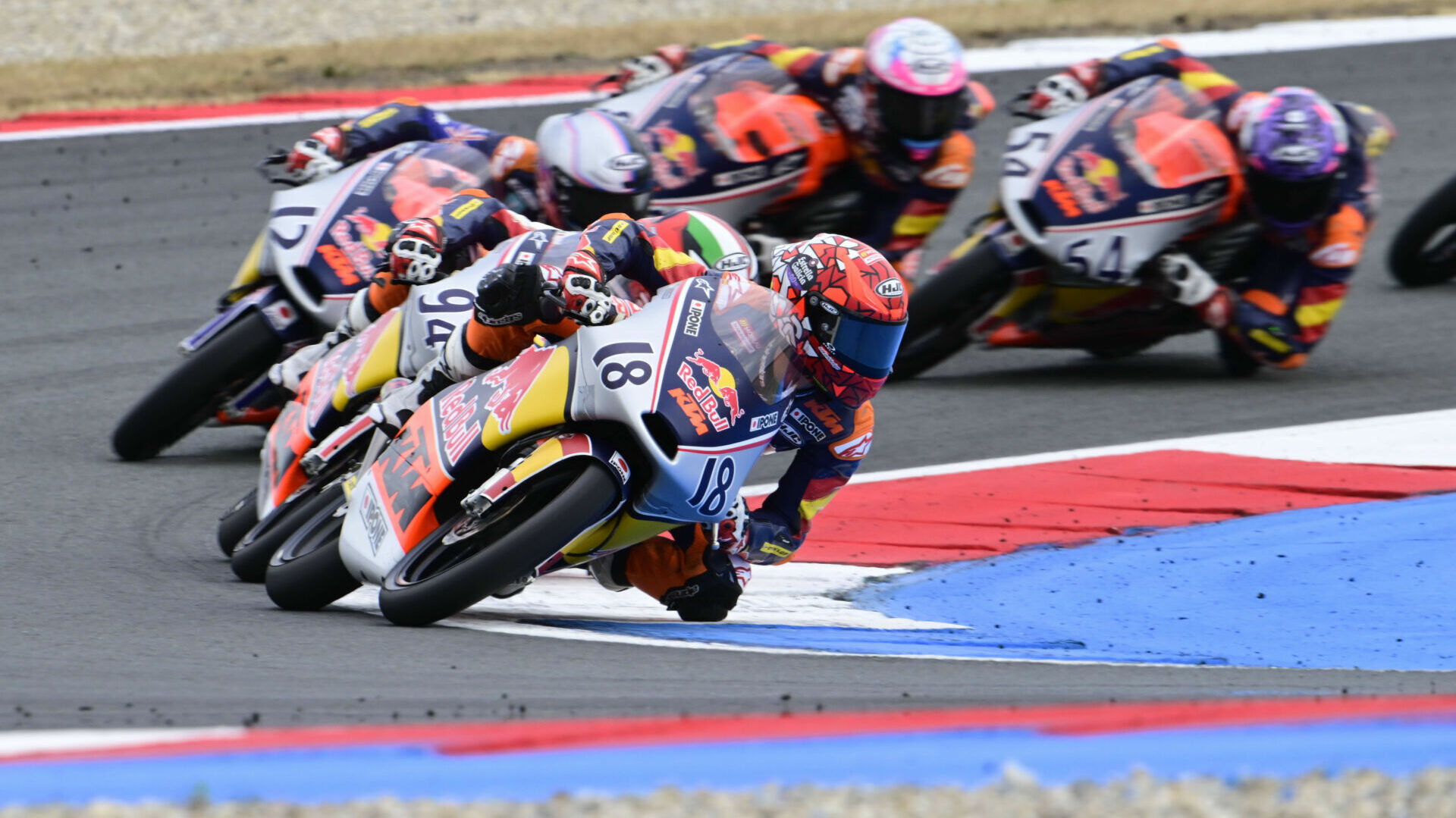 Angel Piqueras (18) leads Red Bull MotoGP Rookies Cup Race One at Assen. Photo courtesy Red Bull.