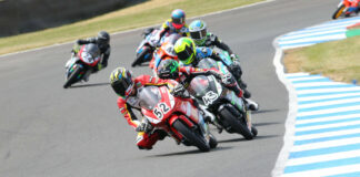 Evan Belford (52) leads Amanuel Brinton (43) while American Julian Correa (40) runs fifth in a British Talent Cup race at Knockhill. Photo courtesy British Talent Cup.