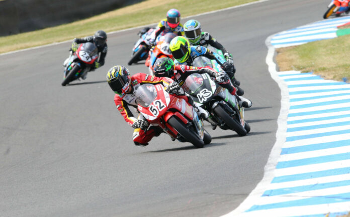 Evan Belford (52) leads Amanuel Brinton (43) while American Julian Correa (40) runs fifth in a British Talent Cup race at Knockhill. Photo courtesy British Talent Cup.