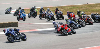 Jake Gagne (1) leads the field through the Turn One chicane at the start of Race Two at Ridge Motorsports Park. Photo by Brian J. Nelson.