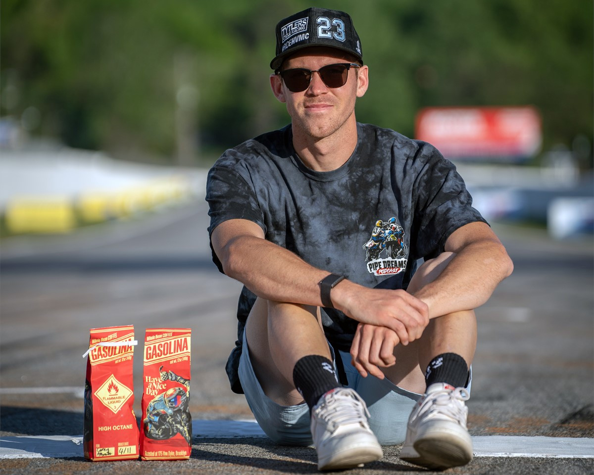 MotoAmerica Superbike racer Corey Alexander with the Have A Nice Day (HAND) Gasolina-blend coffee bearing his likeness. Photo courtesy RideHVMC.