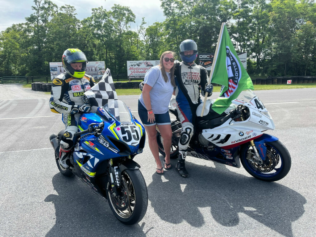 Kevin Elliott's daughter Jennifer Sims (center) with memorial lap riders David Loikits (left) and Eric Helmbach (right) at Summit Point. Photo by Mark Lienhard, courtesy ASRA/CCS.