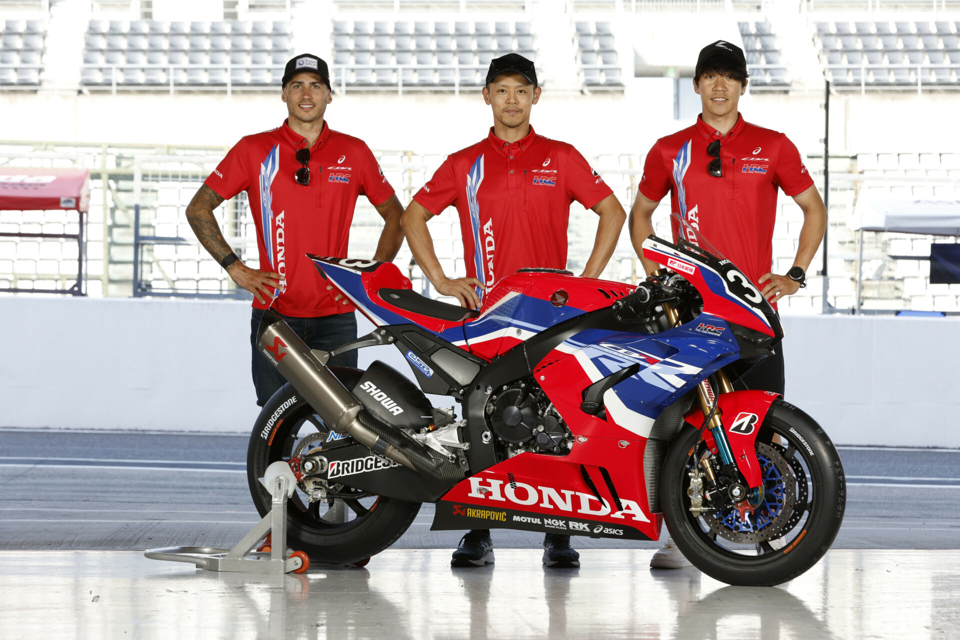 Team HRC with Japan Post riders (from left) Xavi Vierge, Takumi Takahashi, and Tetsuta Nagashima. Photo courtesy HRC.