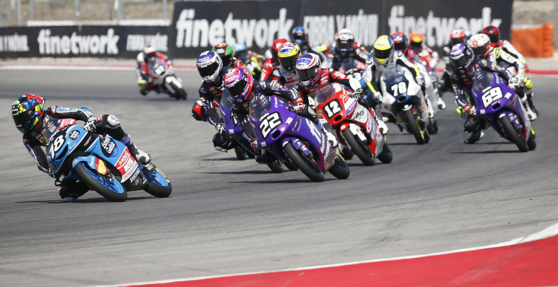 Angel Piqueras (18) leads a JuniorGP race at Algarve International Circuit, in Portimao, Portugal. Photo courtesy Dorna.