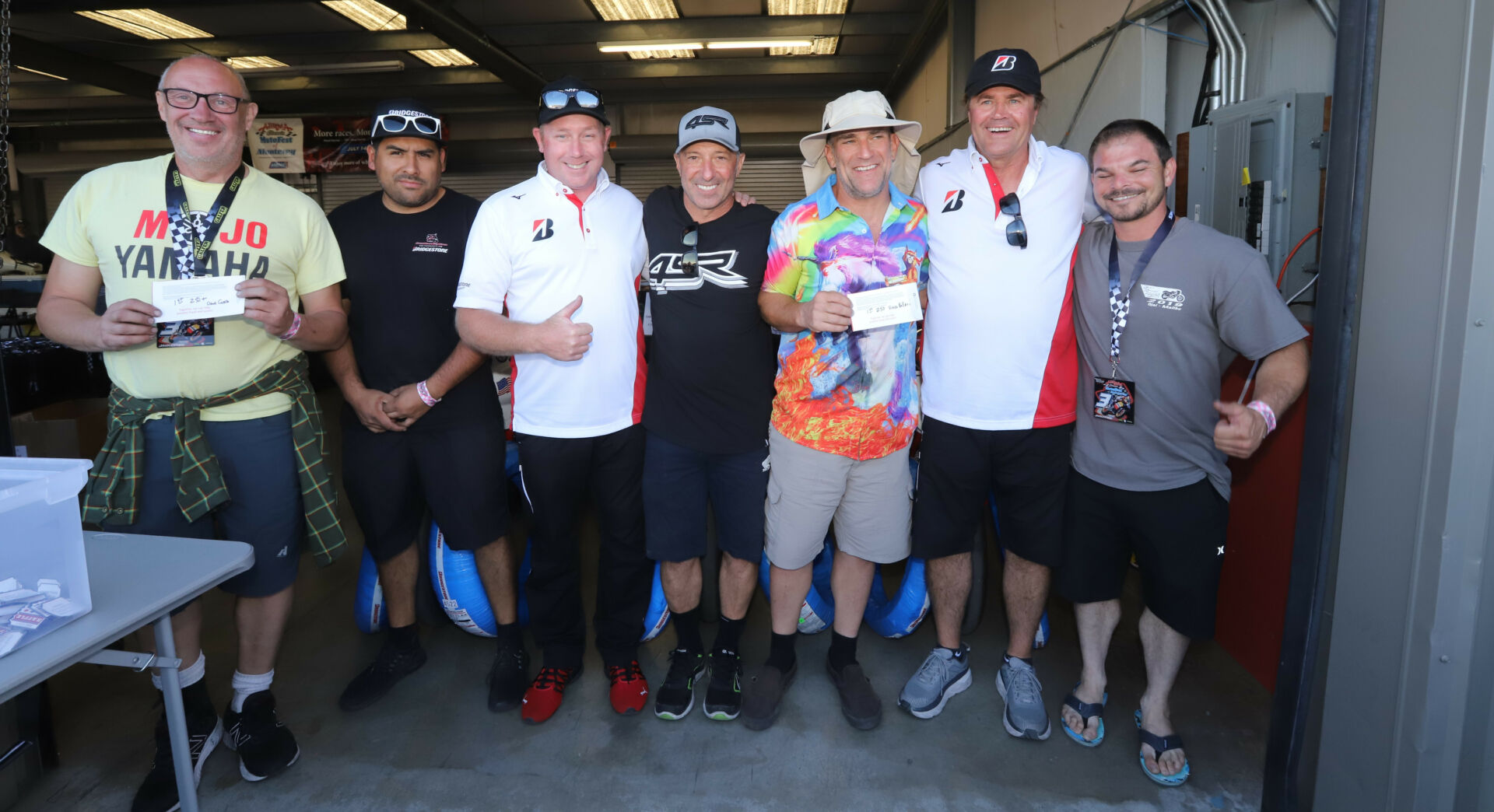 (From left): Dave Crussell (1st place 250+), Road Race City's Moises Figueroa-Perez, Bridgestone Motorcycle Tires Product Specialist Rory O’Neill, Sponsorship Organizer Ralph Staropoli, Vince Rolleri (1st place 250), Bridgestone Motorcycle Tires Road Race Manager Warren Dunham, BJ Bohrer (1st place 125). Photo by etechphoto.com, courtesy AHRMA.