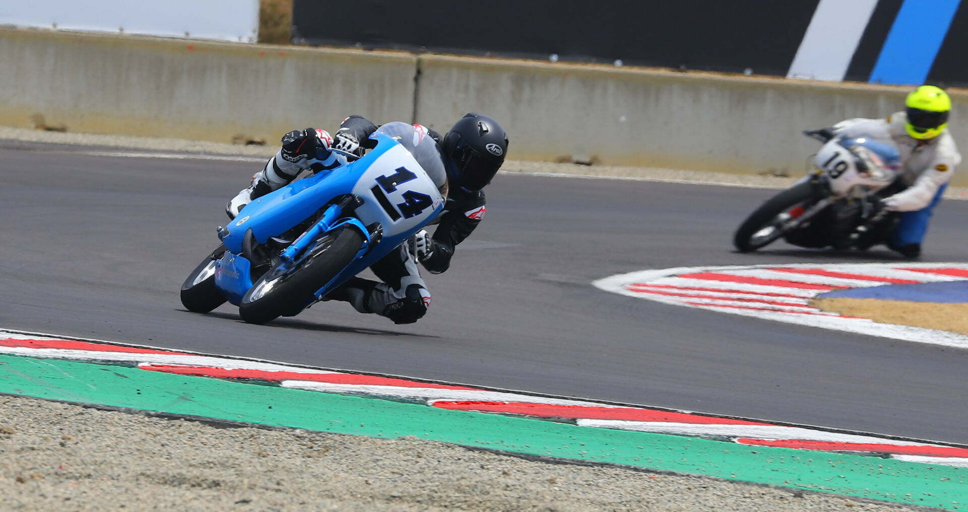 Shane Turpin (14) leads Christopher Spargo (19) at WeatherTech Raceway Laguna Seca. Photo by etechphoto.com, courtesy AHRMA.