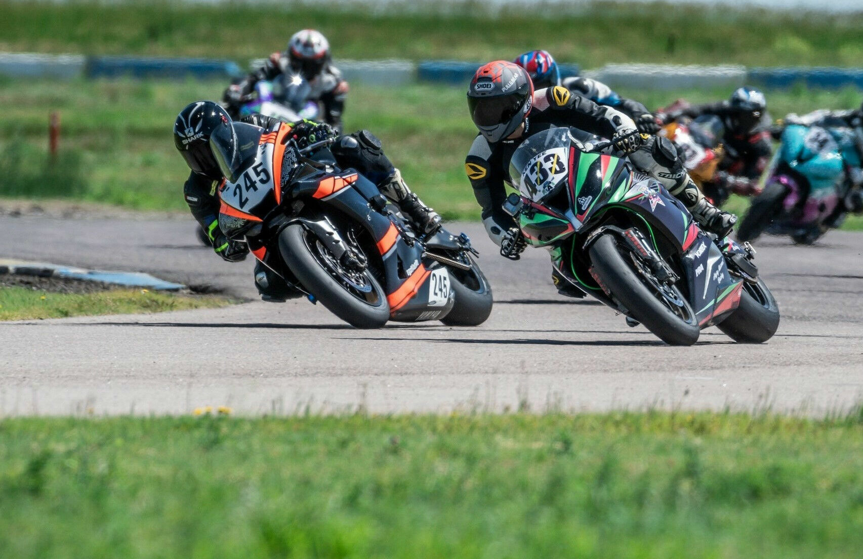 MRA racers Ken Yee (433) and Jason Martinez (245) at High Plains Raceway. Photo by Kelly Vernell, courtesy MRA.