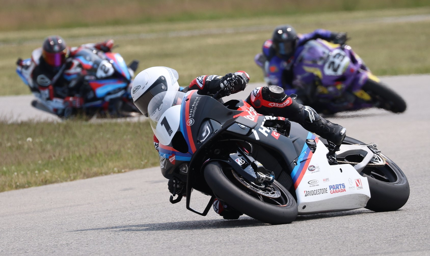 The top three in the Canadian Pro Superbike championship remain unchanged after the trip to Nova Scotia, with the cancellation of round three due to severe flood damage near Atlantic Motorsport Park. Defending champion Ben Young (1) currently trails Alex Dumas (23) in the standings, with Sam Guerin (2) third. Photo by Rob O'Brien, courtesy CSBK.