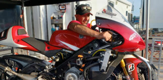 Ralph Staropoli warms up his trick Yamaha TZ250 at the 2023 Heartland Park AHRMA round. Not seen in this picture is his equally-kitted Honda RS250. “The Honda engine is stronger, the Yamaha handles better,” Staropoli says. “I can lap quicker on the Yamaha but love the head-shaking excitement of the Honda.” He builds and wins on them.