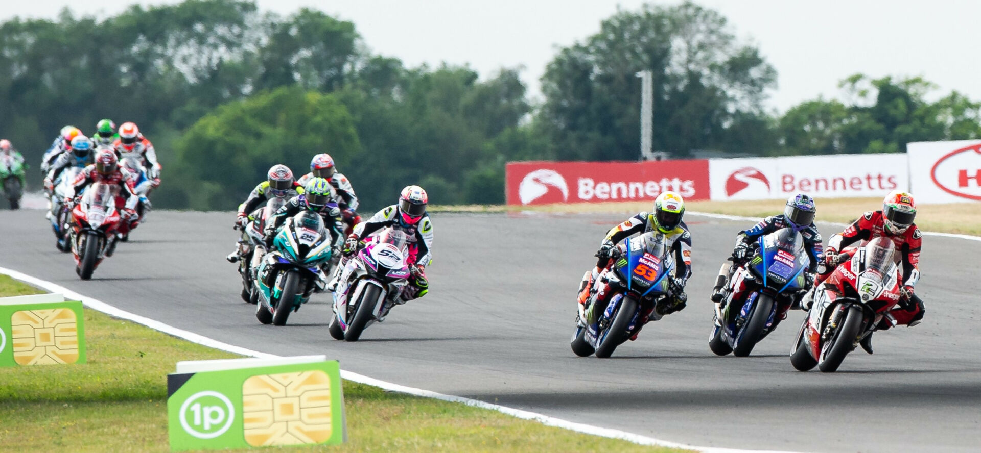 Glenn Irwin (2), Jason O'Halloran (22), and Tito Rabat (53) fight for the lead in British Superbike Race One at Snetterton. Photo courtesy MSVR.