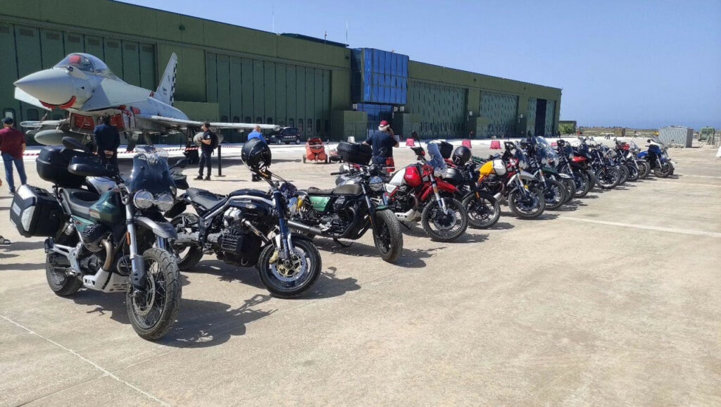 Moto Guzzi motorcycles parked with a Typhoon of the Italian Air Force's 37th Stormo. Photo courtesy Giorgio Parodi Association.