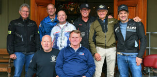 Wayne Rainey (center) is surrounded by legends. (From left) Eddie Lawson, King Kenny Roberts, Doug Chandler, Bubba Shobert, Rick Johnson, Kevin Schwantz, and Carlos Checa. Photo by Jeff Bushnell Photography.