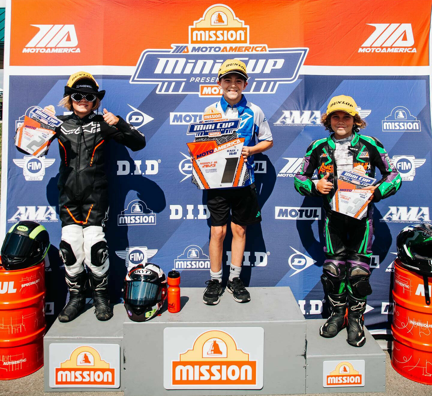 160 Ohvale race winner Nathan Gouker (center), runner-up Kruz Maddison (left), and third-place finisher Connor Raymond (right). Photo courtesy MotoAmerica.