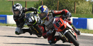 Rhys McNutt (87) and 41 Lincoln Scott (41) race for position during an FIM MiniGP Canada event at Greg Moore Raceway, in British Columbia, Canada. Photo by Colin Fraser.