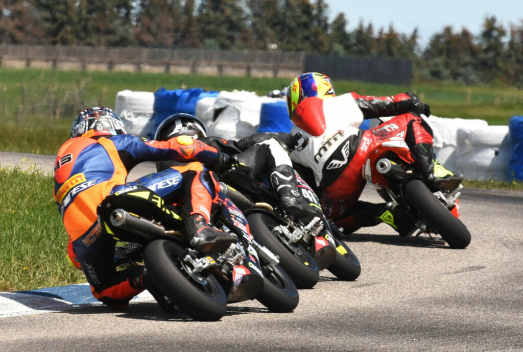 McNutt leads Scott and Hardwick for second during an FIM MiniGP Canada event at Greg Moore Raceway, in British Columbia, Canada. Photo by Colin Fraser.