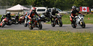 Inaugural FIM MiniGP Canada Series champion Michael Galvis (83) trails rivals Treston Morrison (125) and Ben Hardwick (43) ahead of the rest of the field early in race one at Lombardy on Sunday. Photo Jeremy Fleming, courtesy FIM MiniGP Canada.