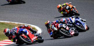 TOHO Racing (104), seen here trailing Team HRC with Japan Post (33), Yoshimura SERT Motul (12), and F.C.C. TSR Honda France (1) in the lead group early in the Suzuka 8-Hours race, has been disqualified from second place. Photo by Kohei Hirota.