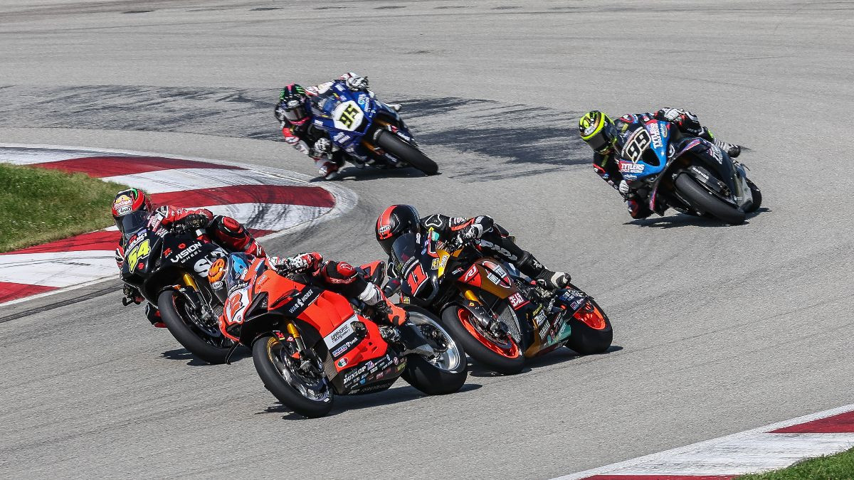Josh Herrin (2) tries to hold off Mathew Scholtz (11) and Richie Escalante (54) in the third and final Superbike race of the weekend while PJ Jacobsen (99) and JD Beach (95) give chase.Photo by Brian J. Nelson, courtesy MotoAmerica.