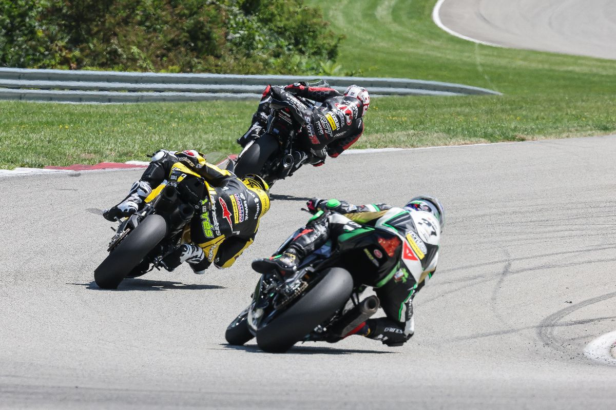 Eventual winner Tyler Scott leads Xavi Fores and Stefano Mesa at the front of the Supersport race at Pittsburgh International Race Complex. Photo by Brian J. Nelson, courtesy MotoAmerica.
