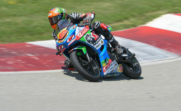 Max Van (48) on the SportbikeTrackGear.com Kawasaki Ninja 400 at Pittsburgh International Race Complex (a.k.a. PittRace). Photo by Michael Goze/Contact Patch Photography, courtesy SportbikeTrackGear.com.