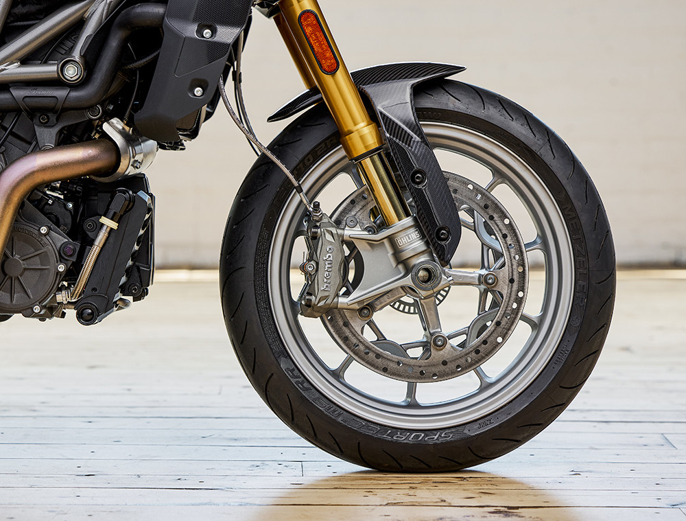 The carbon-fiber front fender may attract attention, but equally impressive are the Ohlins forks and Brembo brakes. Metzeler M9 RR tires provide excellent grip for anything on the street. Photo courtesy Indian Motorcycle.