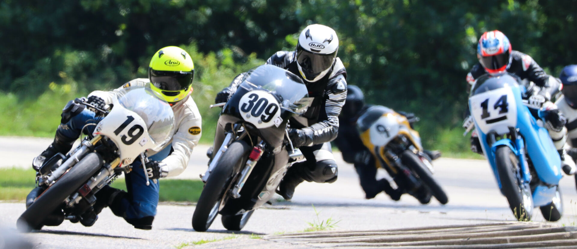 Christopher Spargo (19) leads Tim Joyce (309), Shane Turpin (14), and Colton Roberts (9) during an AHRMA Vintage Cup race at Blackhawk Farms Raceway, in Illinois. Photo by Craig Chawla, courtesy AHRMA.