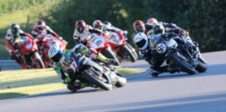Action from the 2022 4SR Pro Challenge with Stefano Mesa (37) leading Nate Kern (9T), Jeff Graham (222), Arnold Hastings (38A), and the rest of the field. Photo by Craig Chawla, courtesy AHRMA.