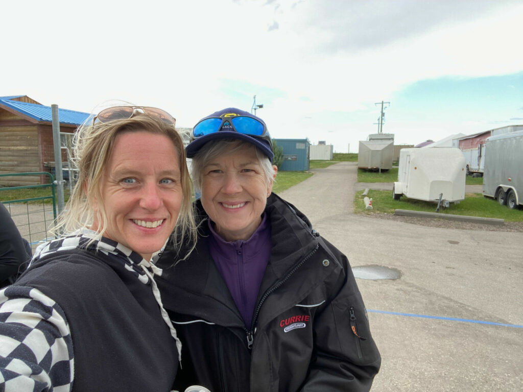 Former racer and current racer mom Misti Hurst (left) and Toni Sharpless (right), a former racer and the organizer of the FIM MiniGP Canada series. Photo by Misti Hurst.