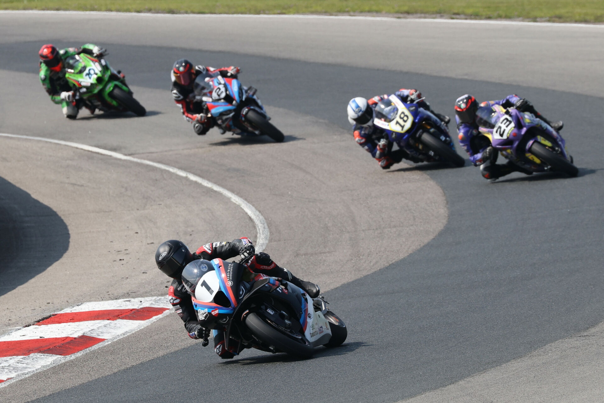 Ben Young (1) leads Saturday's Superbike race at Canadian Tire Motorsport Park with Sam Guerin (2), Alex Dumas (23), and Tomas Casas (18) in pursuit. Photo by Rob O'Brien, courtesy CSBK.