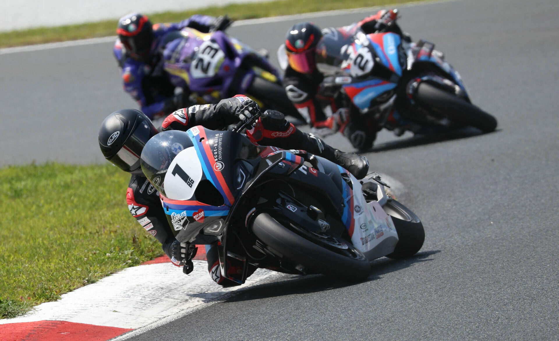 This was the closest the top three would be during the second of three scheduled Superbike races at Canadian Tire Motorsport Park (CTMP). Ben Young (1) pulled away early to finish just over five seconds ahead of Sam Guerin (2) and championship leader Alex Dumas (23). Photo by Rob O'Brien, courtesy CSBK.