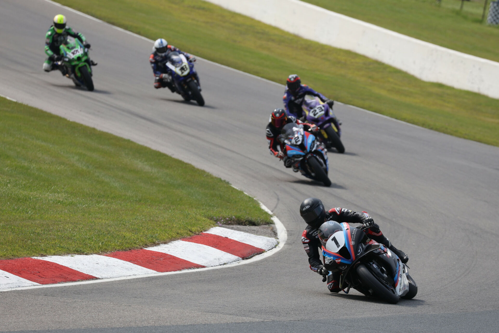 Ben Young (1) scored a perfect weekend at the CTMP tripleheader, winning all three GP Bikes Pro Superbike races over Sam Guerin (2) and Alex Dumas (23). Tomas Casas (18) finished race three in fourth ahead of Jordan Szoke (101). Photo by Rob O'Brien, courtesy CSBK.