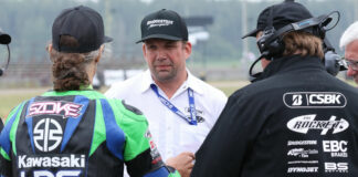 Ross Millson (center) speaking with 14-time CSBK Champion Jordan Szoke (left) and CSBK Tech official Fred Benjamin (right) at Grand Bend Motorplex. Photo by Rob O'Brien, courtesy CSBK.