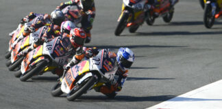 Rico Salmela (27) leads Angel Piqueras (18) and the rest of the field during Red Bull MotoGP Rookies Cup Race Two in Austria. Photo courtesy Red Bull.