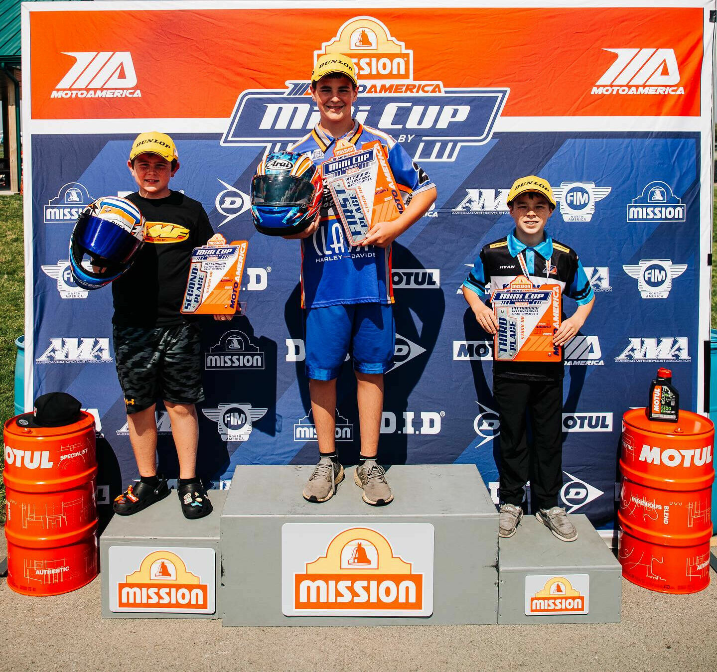 Stock 110 race winner Cole Varnes (center), runner-up Joel Laub (left), and third-place Ryan Clark (right). Photo courtesy MotoAmerica.